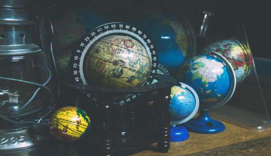 Collection of terraqueous balloons in shelf
